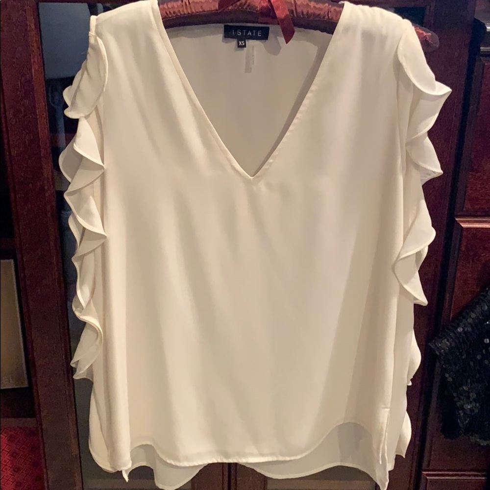 1. State Ruffle Open Arm Top